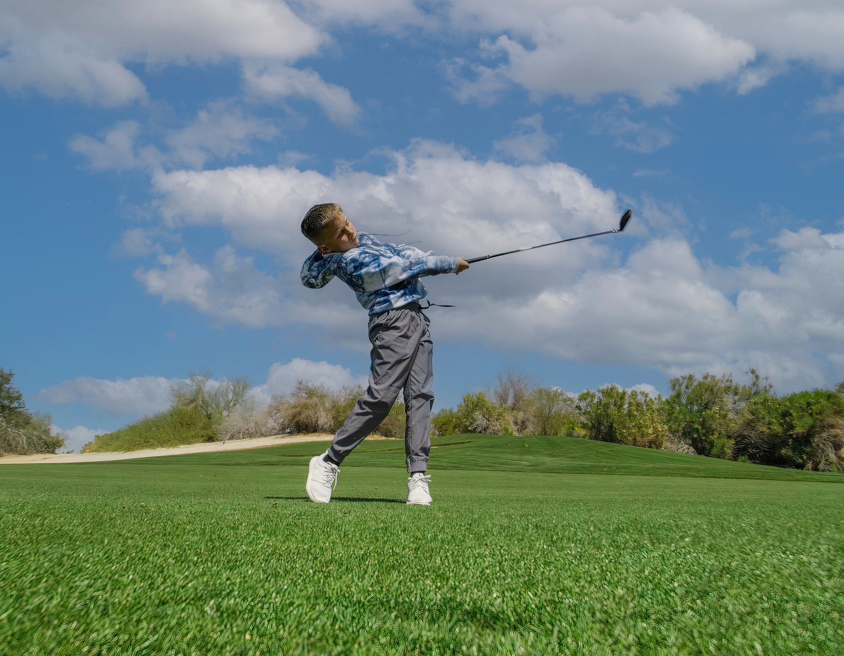 Elevate Your Junior Golfer's Game with Our Performance Apparel Line